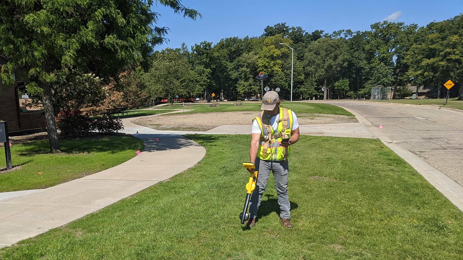 OHM Advisors engineer collecting as-built data with an Eos Arrow GNSS receiver on a rangepole