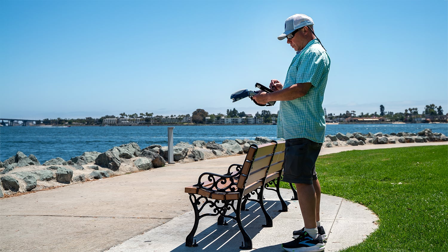 Municipal employee collecting park assets with a Skadi Gold GNSS receiver and smart handle